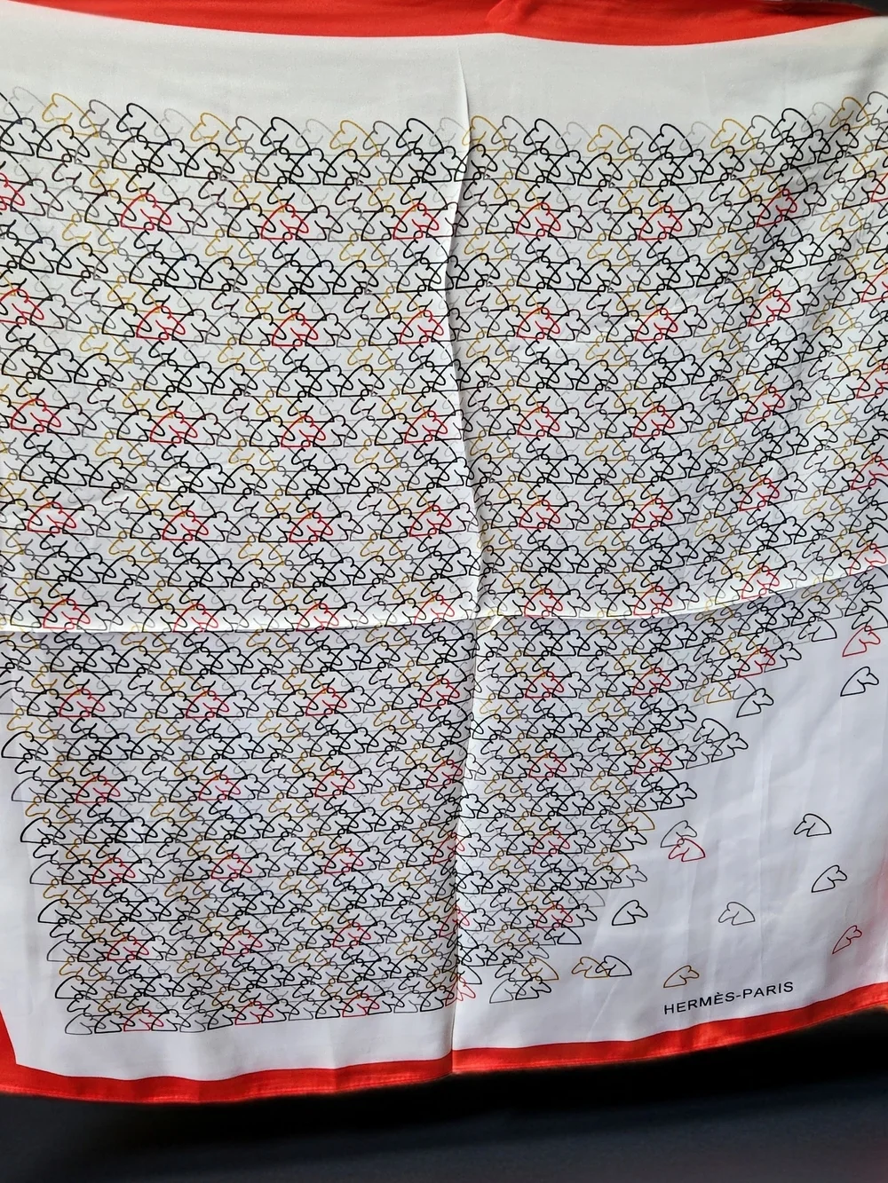 Hermès White Scarf with Red, Black, Gold and Gray Motif